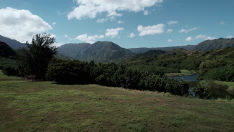 Rising-up-revealing-the-beautiful-fertile-delta-of-the-Lumaha'i-River,-North-Shore,-Kauai,-aerial