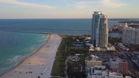 Aerial-drone-view-of-a-calm-morning-at-the-South-pointe-Beach,-in-sunny-Miami,-USA