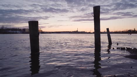 Wooden-poles-in-the-sea-after-the-sunset