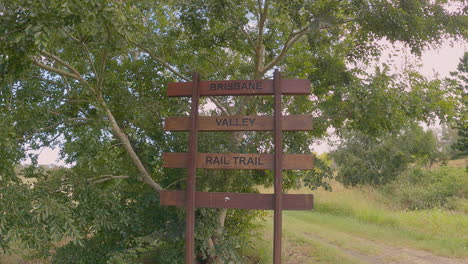 Old-Heritage-sign-along-old-rail-line,-Brisbane-Valley-Rail-Trail,-Qld-4K