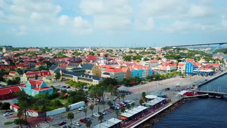 Aerial-orbit-of-the-Otrobanda-district-in-Willemstad,-Curacao,-Dutch-Caribbean-island