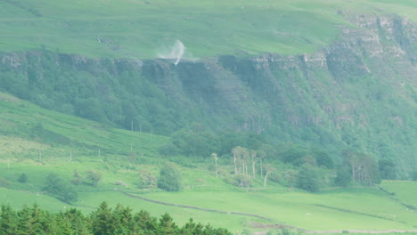 CLOSEUP---Scottish-waterfalls-being-blown-upwards-by-strong-winds,-west-coast