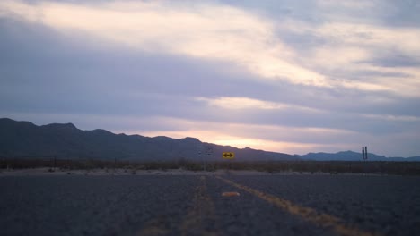 Chisos-Mountain-Sunset-with-Low-Angle-Slide-across-Highway-4K