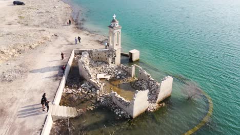 Orbit-Shot-Of-Beautiful-Saint-Nicholas-Church-Ruined-with-Water,-Alassa,-Limassol-City-,-Cyprus