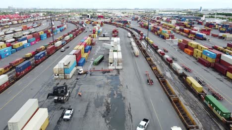 Aerial-forward-view-over-a-storage-area-full-of-colorful-containers