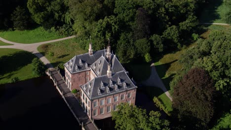Orbiting-aerial-over-historic-castle-Duivenvoorde-the-Netherlands