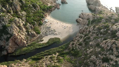 exotic-small-sandy-beach-between-mountains-,-Sardinia-island,-Italy