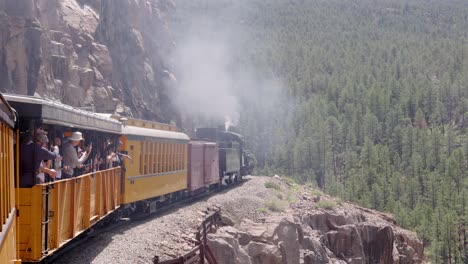People-riding-on-a-train-in-Durango,-Colorado