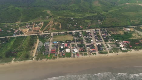 Bird's-Eye-View-Of-The-Coastal-Town-Of-La-Curia,-Santa-Elena-Province,-Ecuador---drone-shot