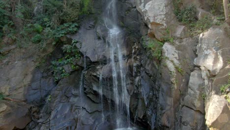 Waterfall-Flowing-Through-Crag-Mountains---Cascada-de-Yelapa-In-Jalisco,-Mexico