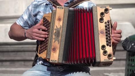 A-close-up-of-an-accordion-being-played-outdoor