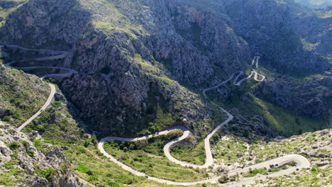 View-of-a-beautiful-serpentine-road-in-Del-Reis,-Mallorca,-Spain