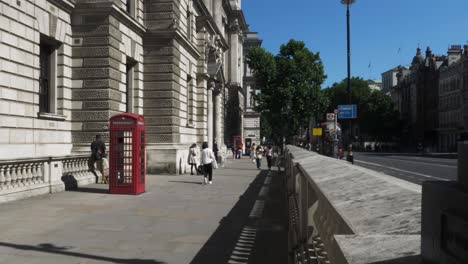 Sunny-Morning-View-Outside-HM-Treasury-Building-With-Iconic-Red-Telephone-Box-In-Westminster