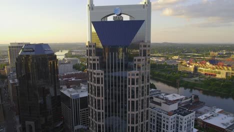 Aerial-view-around-the-AT-T-building-in-downtown-Nashville,-sunny-evening-in-USA---orbit,-drone-shot