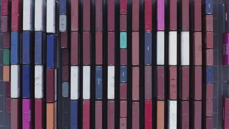 Vibrant-And-Colorful-Storage-Containers-In-Husky-Terminal-At-The-Port-of-Tacoma---aerial-shot