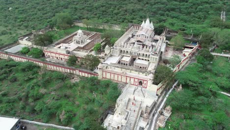 Aerial-shot-of-Palitana-temple-surrounded-with-dense-forest