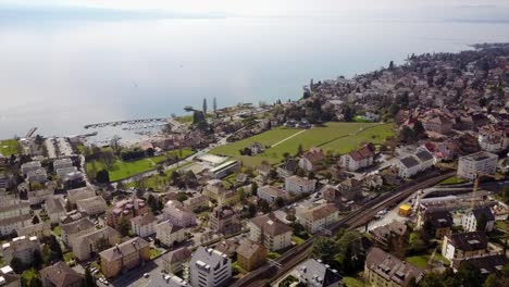 Aerial-drone-view-of-the-leman-Lake,Vaud,-Switzerland-in-Lausanne-with-harbor-and-vineyards