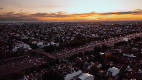 Aerial-hyperlapse-of-traffic-on-highway-in-Buenos-Aires-at-sunset