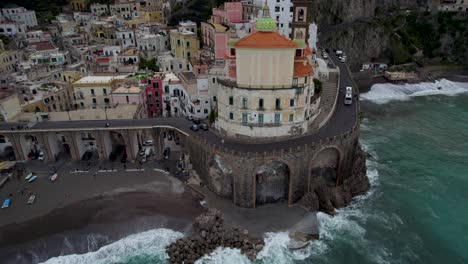 Cars-Driving-on-Cliffside-Road-along-the-Beautiful-Amalfi-Coast,-Italy---Aerial