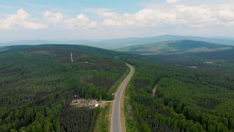 4K-Drone-Video-of-Elliott-Highway-through-White-Mountains-near-Fox,-Alaska-on-Summer-Day