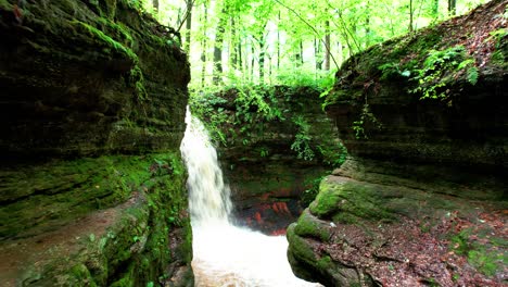 A-zoom-in-shot-of-Cascade-falls-on-a-sunny-day-at-Nelson-Kennedy-Ledges-State-Park-in-northeast-Ohio