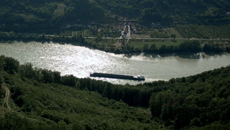 Cargo-ship-travel-along-the-Danube-rive