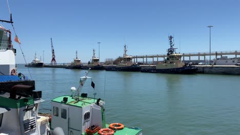 zoom-in-to-some-armed-forces-ships-on-the-port-in-Alcântara,-Portugal
