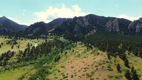 Low-Altitude-Aerial-Dolly-Shot-of-Mountainside-in-Colorado-Springs,-Wide-Angle