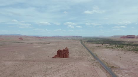 Rock-Formation-Standing-Alone-in-Arid,-Southwest-Desert-of-Arizona---Aerial