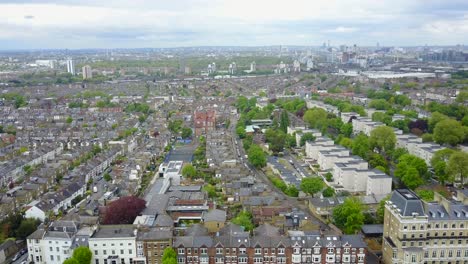 Panning-shot-of-London-residential-streets-with-row-houses-in-summer