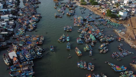 Overpopulated-harbor-with-fishing-boats-in-Vietnam,-aerial-view-La-Gi,-Binh-thuan,-south-vietnam