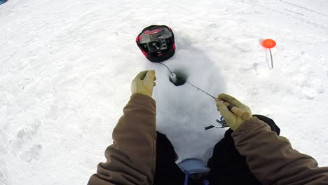 Viewpoint-Of-A-Fisherman-While-Ice-Fishing-On-Ice