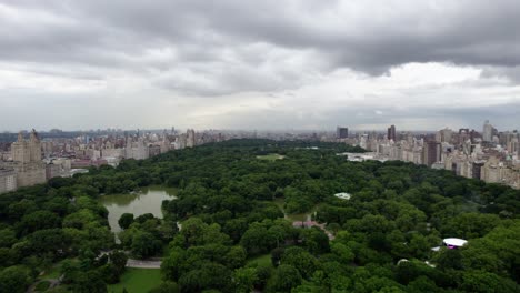 Aerial-view-over-the-Central-Park,-dark,-overcast,-summer-day-in-New-York,-USA