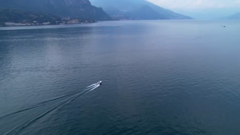Aerial-View-Of-Speedboat-Going-Across-Lake-Como