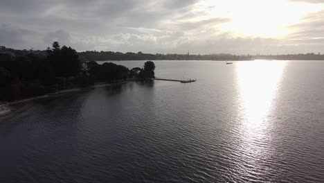Perth-Swan-River-Aerial-View-Towards-Point-Walter-Jetty-At-Sunset