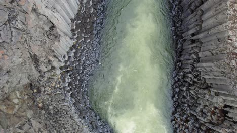 Aerial-view-over-river-in-Iceland-in-Stuðlagil-Canyon
