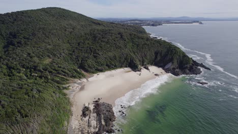 Waves-Crashing-On-Sandy-Beach-Burgess-In-Forster,-NSW,-Australia---aerial-drone-shot