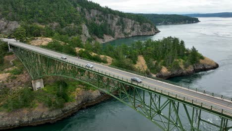 Wide-static-aerial-view-of-cars-commuting-over-the-Deception-Pass-bridge