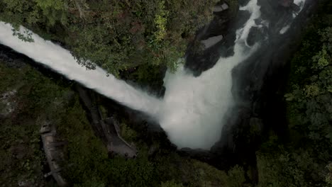 Devil's-Cauldron-Powerful-Waterfall-In-Baños-de-Agua-Santa,-Ecuador---drone-shot