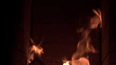 Fire-roaring-in-a-fireplace-dolly-shot