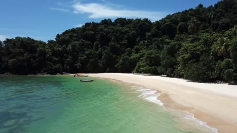A-Drone-clip-from-an-empty-Tropical-Beach-called-Pasir-Panjang-on-Kapas-Island,-Malaysia-east-coast