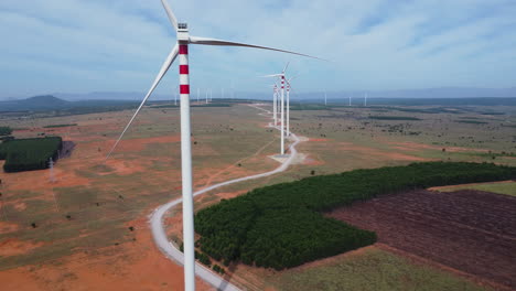 Freshly-built-power-plant-windmills-in-Vietnam,-aerial-close-up-view