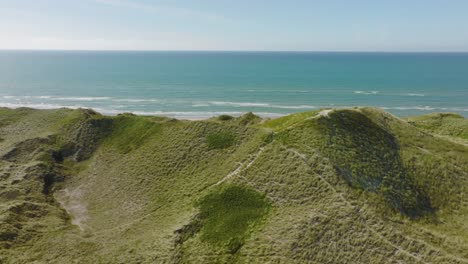 An-aerial-view-from-behind-the-sanddune-can-be-seen-of-the-beach-and-the-North-Sea