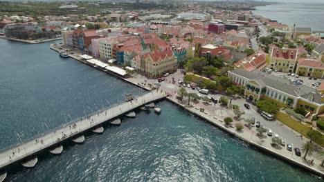 Aerial-approach-to-the-Punda---historical-center-of-Willemstad,-Curaçao