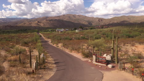 Entrance-and-road-leading-to-Tanque-Verde-Ranch-in-Tucson,-Arizona,-Aerial-View