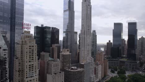 Aerial-view-in-front-of-tall-skyscrapers-cloudy-day-in-Midtown,-New-York,-USA