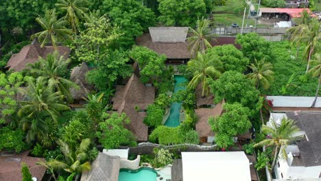 aerial-pan-down-of-tropical-pool-villas-on-Gili-Trawangan-Island