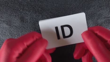 An-'ID',-identification-card-being-presented-or-checked-to-gain-entry-or-to-prove-someone's-identity