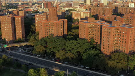 Cinematic-aerial-rise-over-Harlem-housing-project-r