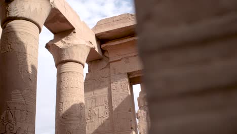 Columns-and-walls-full-of-hieroglyphs-in-the-ancient-temple-of-Kom-Ombo,-egypt